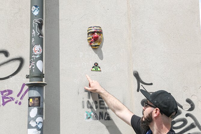 Alternative Bucharest Walking Tour - Starting at Revolution Square and Memorialul Renasterii