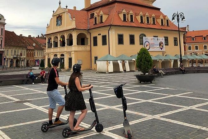 Brasov Old Town Guided Tour With Electric Scooters - One hour in Brasov’s historical center