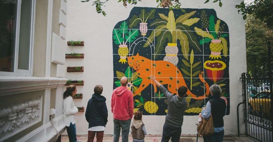Bucharest Alternative Walking Tour - The restored Cinema Capitol Garden mural