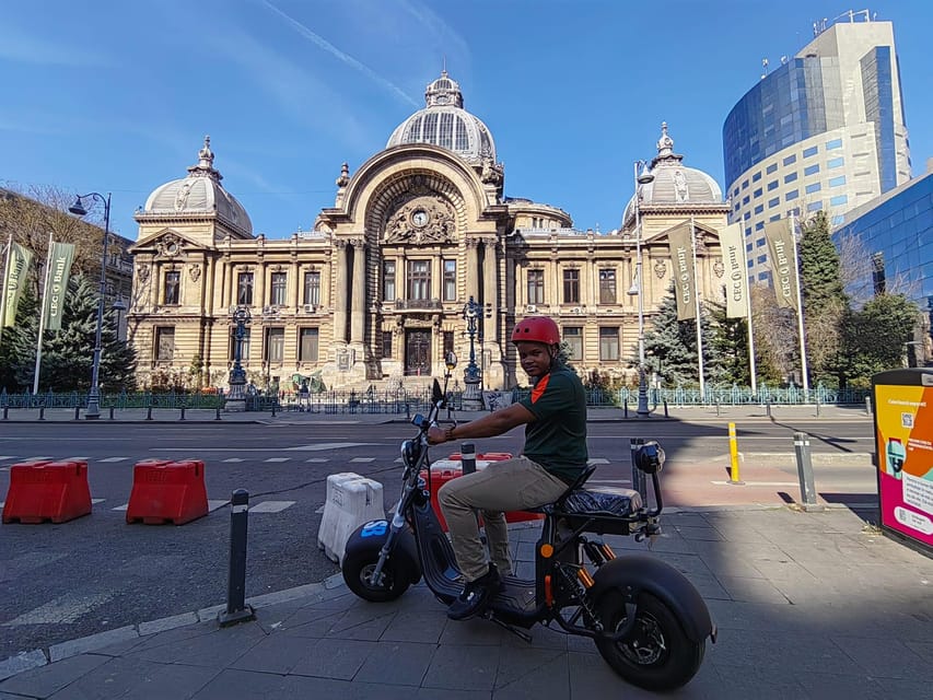 Bucharest electric city tour by Smart Balance #green - House of the Free Press and the Triumphal Arch