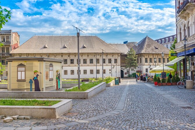 Bucharest one day tour with Parliament Palace and Village Museum - The Romanian Athenaeum and royal Bucharest
