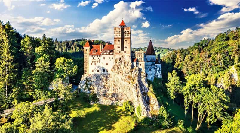Bucharest: Peles Castle, Bran Castle, & Brasov Old Town Tour - Crossing into Transylvania by mountain road