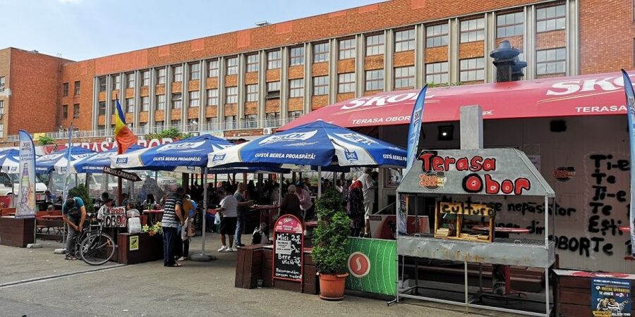 Bucharest: Street Food Tour with a Local Guide - A trolleybus ride back toward University Square