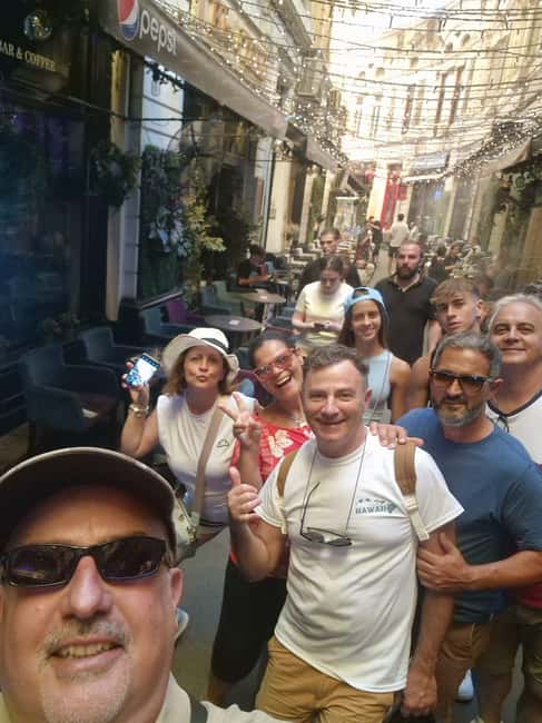 Bucharest: Walking tour with Italian speaking guide for small groups - Starting at Caru’ cu Bere in the Old Town
