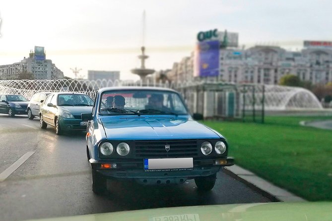 Private -RedPatrol Tour of Bucharest with a Romanian Vintage Car - The unification monument and the House of the Free Press